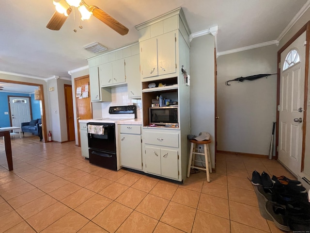 kitchen featuring white cabinetry, ornamental molding, light tile patterned floors, and electric range