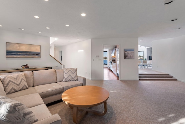 living room featuring light colored carpet