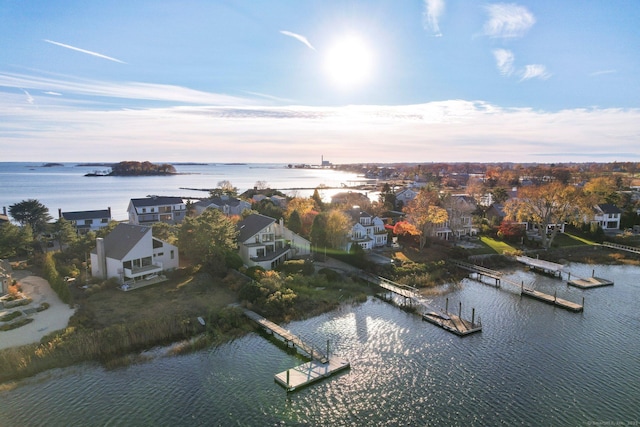 aerial view at dusk with a water view