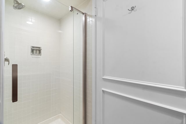 bathroom featuring walk in shower