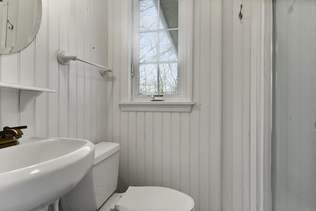 bathroom with sink and toilet