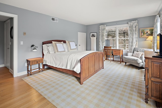 bedroom featuring light hardwood / wood-style flooring