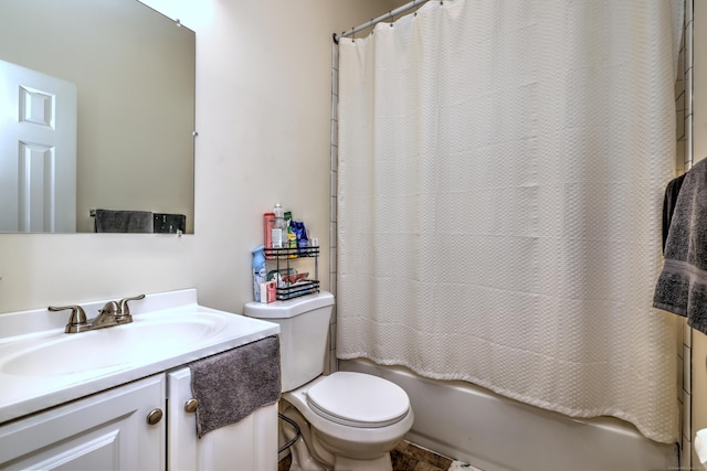 full bathroom featuring shower / bath combination with curtain, vanity, and toilet