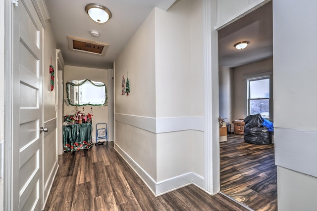 hall with dark hardwood / wood-style floors