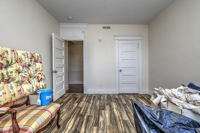 interior space with dark hardwood / wood-style floors