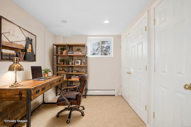 office space with light tile patterned floors and a baseboard heating unit