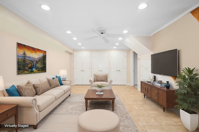 living room featuring light tile patterned flooring and ceiling fan