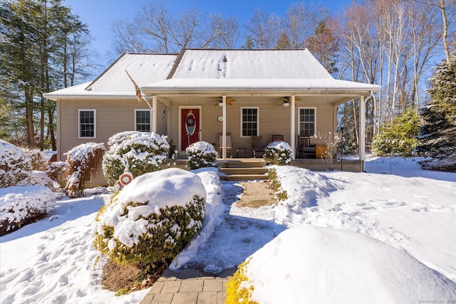 view of front of house featuring ceiling fan and a porch