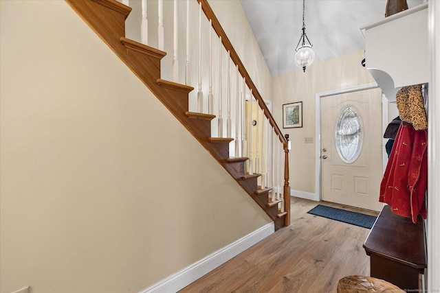 foyer entrance with hardwood / wood-style flooring