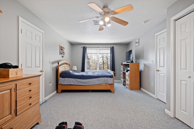 carpeted bedroom featuring ceiling fan