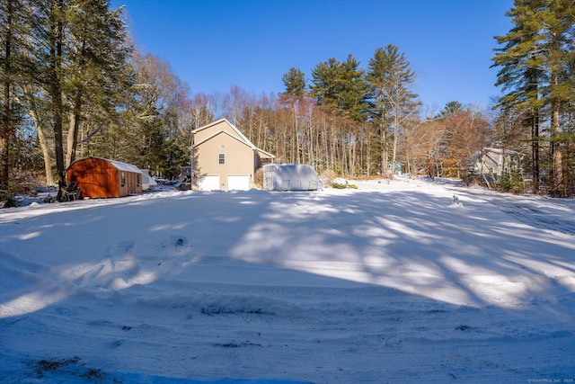 view of yard layered in snow