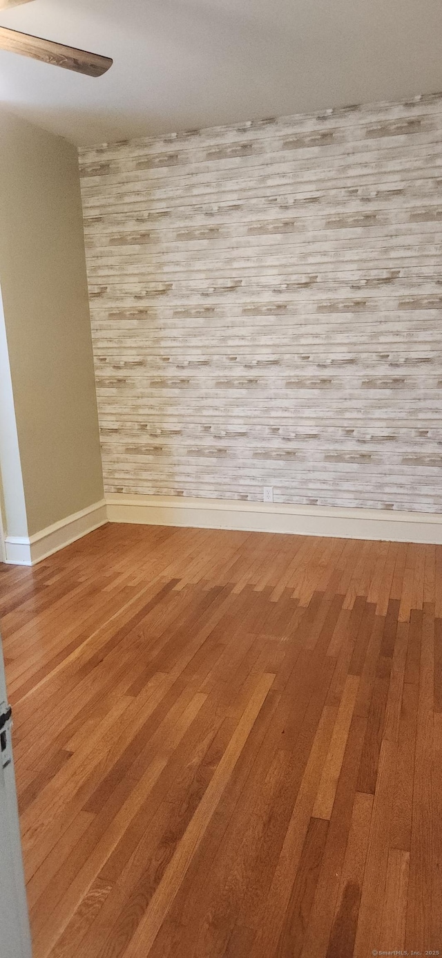 empty room with light hardwood / wood-style floors