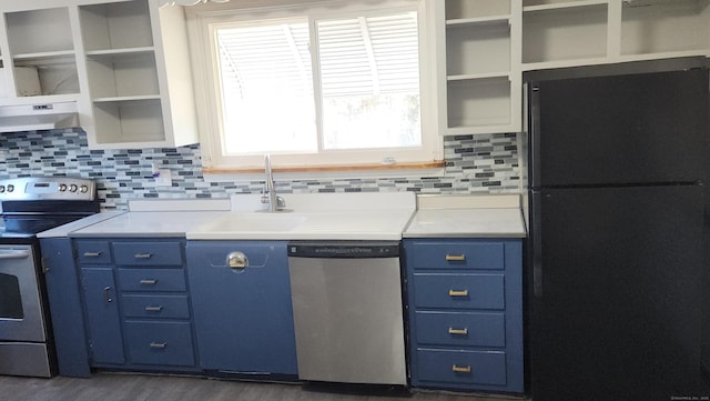 kitchen with blue cabinets, wood-type flooring, sink, decorative backsplash, and stainless steel appliances