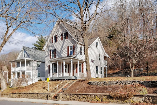 view of front property featuring covered porch