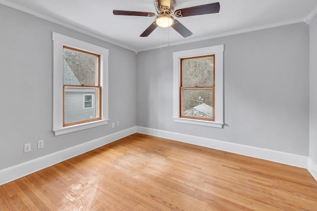 unfurnished room with crown molding, ceiling fan, and light wood-type flooring