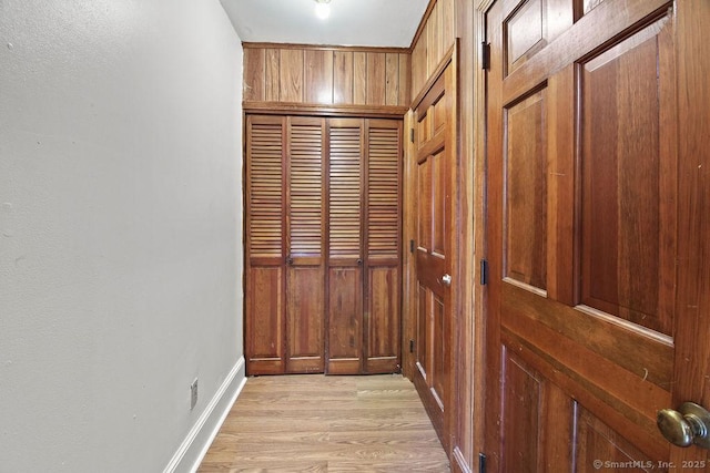 hallway with light wood-type flooring