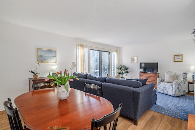 dining space featuring light hardwood / wood-style flooring