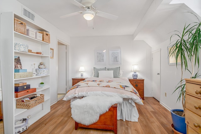 bedroom with ceiling fan and light hardwood / wood-style flooring
