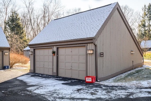 view of snow covered garage