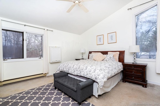 carpeted bedroom with ceiling fan, lofted ceiling, and a baseboard heating unit