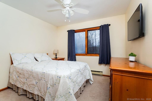 bedroom with ceiling fan, a baseboard radiator, and light carpet