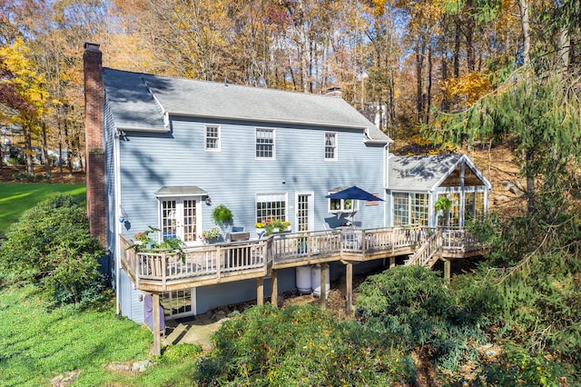 rear view of property with a deck