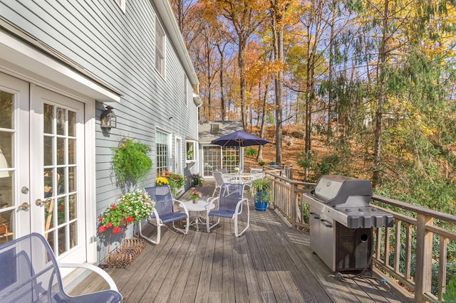 wooden terrace featuring french doors