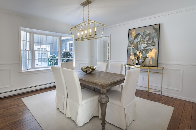 dining room featuring a baseboard heating unit, crown molding, and dark hardwood / wood-style floors