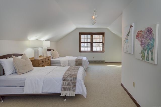 bedroom featuring lofted ceiling, carpet flooring, track lighting, and baseboard heating