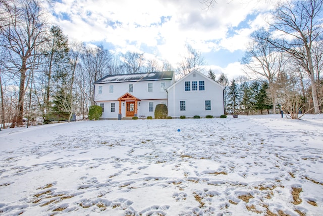 view of snow covered property