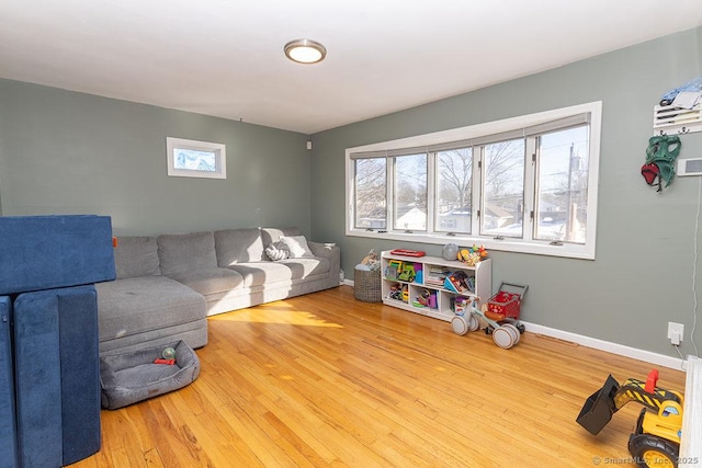 rec room featuring hardwood / wood-style flooring