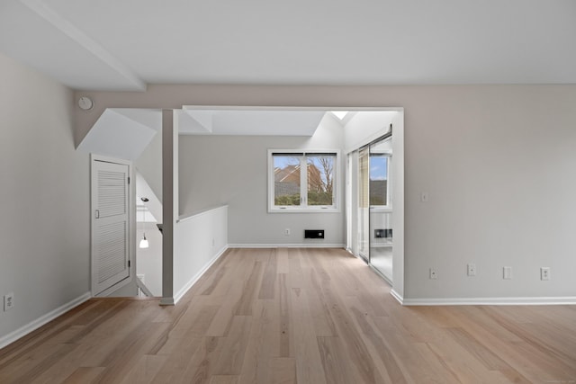 80 Seaview Ter Unit 12, Guilford, CT 06437 - unfurnished living room with light wood finished floors and baseboards