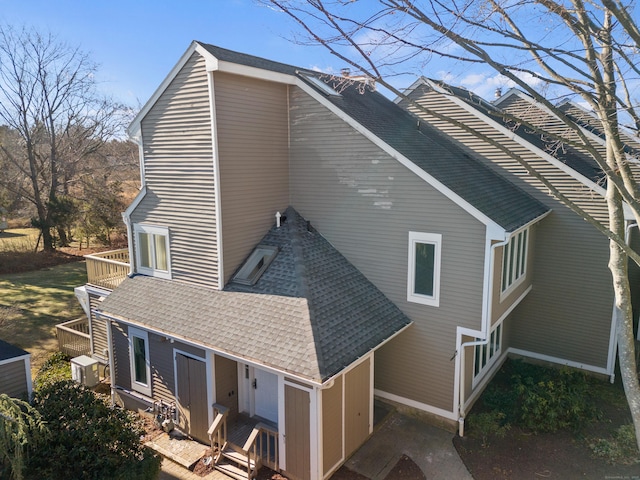 80 Seaview Ter Unit 12, Guilford, CT 06437 - view of home's exterior with a shingled roof and a balcony