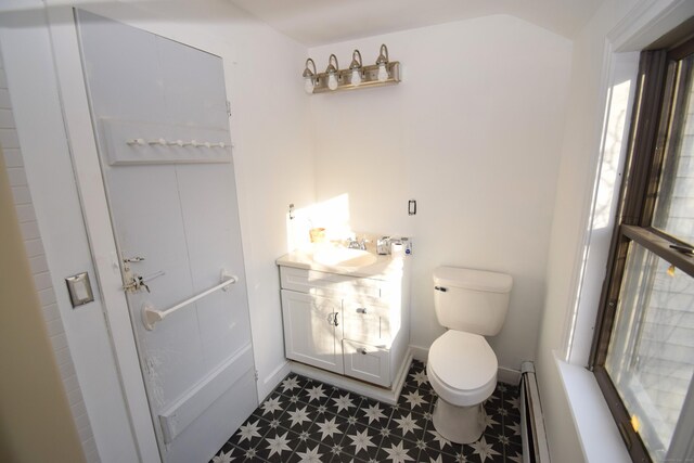 34 Lyme St, Old Lyme, CT 06371 - bathroom with tile patterned floors, toilet, a baseboard heating unit, and vanity