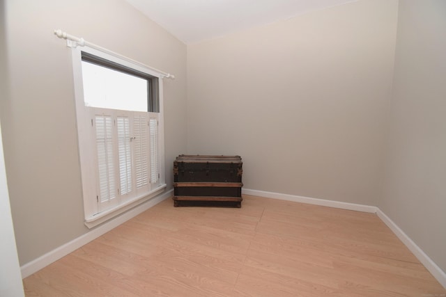 34 Lyme St, Old Lyme, CT 06371 - spare room with light wood-style floors and baseboards