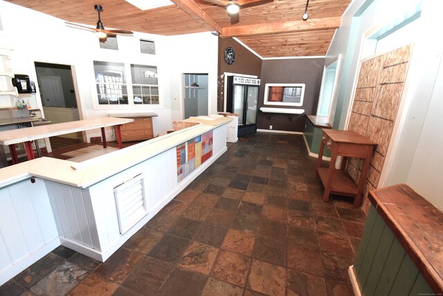 34 Lyme St, Old Lyme, CT 06371 - hallway with wood ceiling, stone tile floors, and baseboards