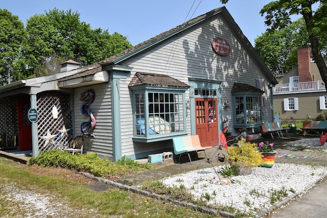 34 Lyme St, Old Lyme, CT 06371 - view of front facade with a chimney