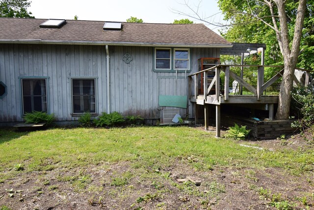 34 Lyme St, Old Lyme, CT 06371 - view of home's exterior featuring a yard and roof with shingles