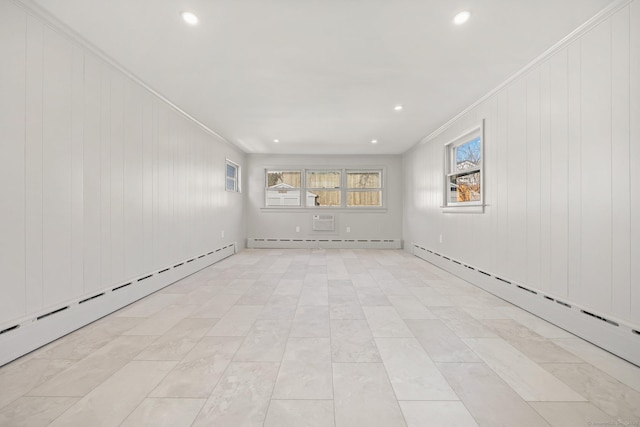 empty room with a baseboard radiator and ornamental molding