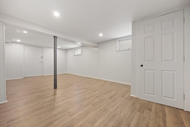 basement with light wood-type flooring