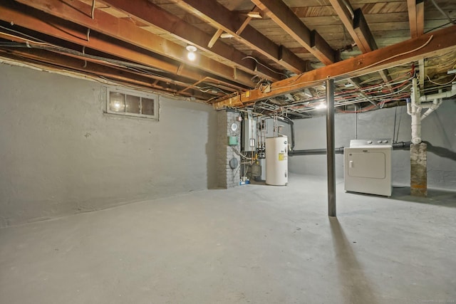 basement featuring washer / dryer and water heater