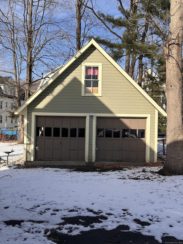 view of snow covered garage