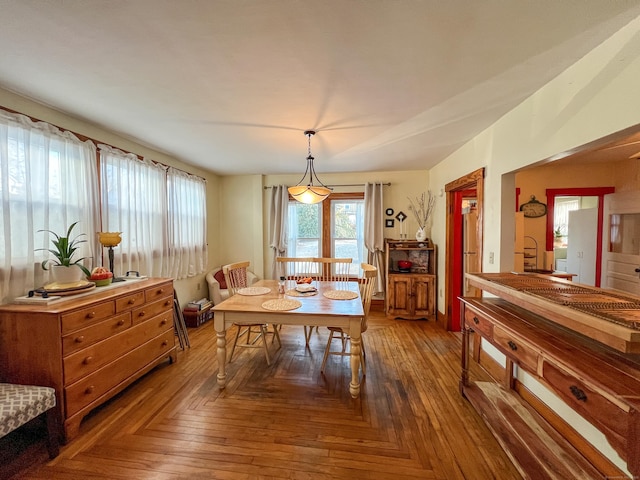 dining room with parquet floors