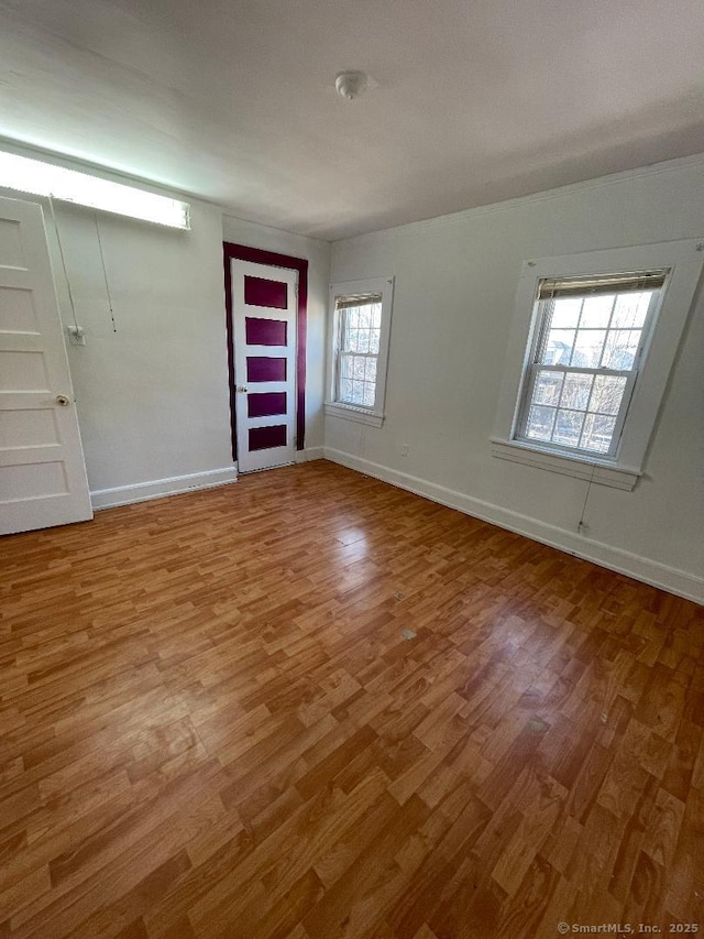 unfurnished room featuring hardwood / wood-style floors