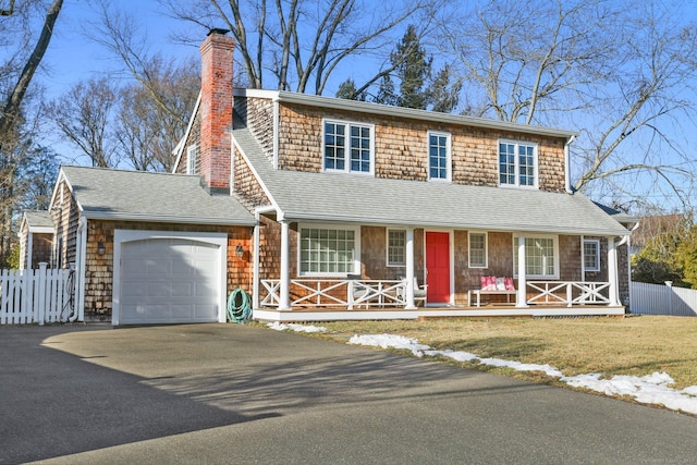 view of front facade featuring a garage and a porch