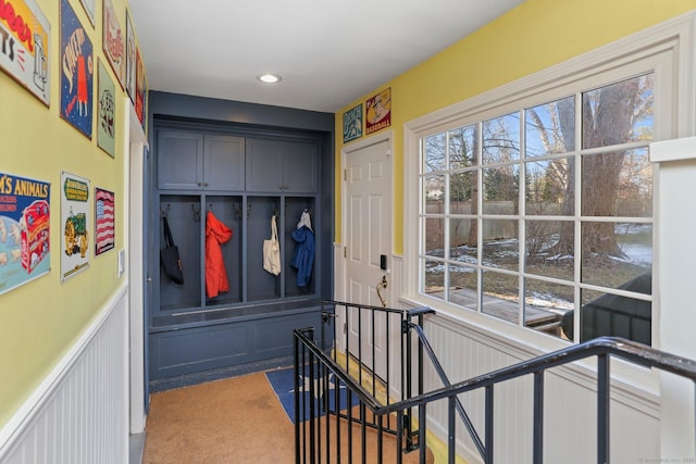 mudroom featuring carpet flooring