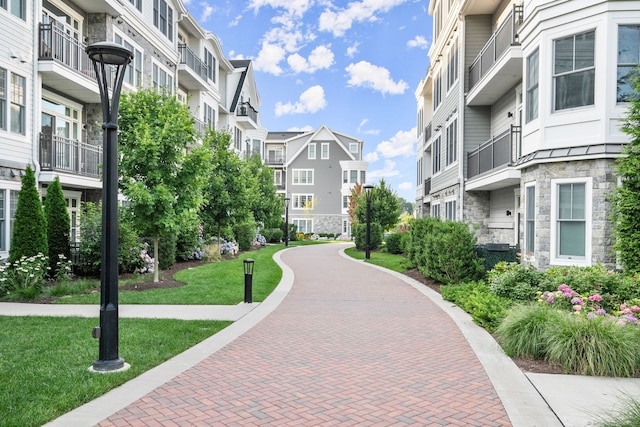 view of home's community featuring a yard