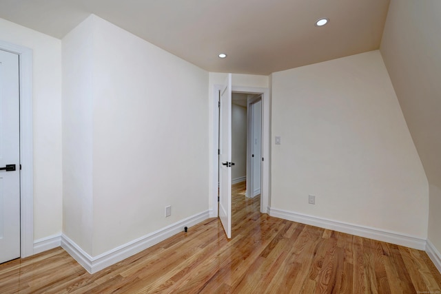 702 King St, Stratford, CT 06614 - spare room featuring light wood-type flooring, recessed lighting, and baseboards