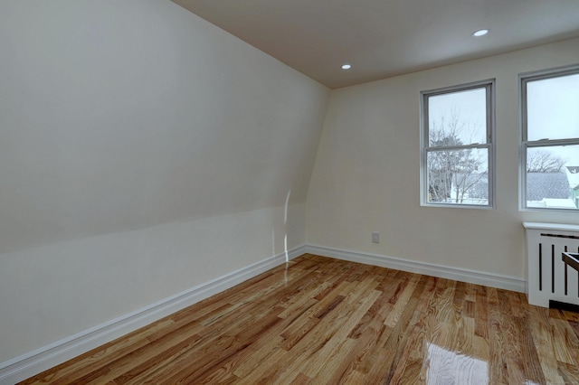 702 King St, Stratford, CT 06614 - unfurnished room featuring light wood finished floors, baseboards, and recessed lighting