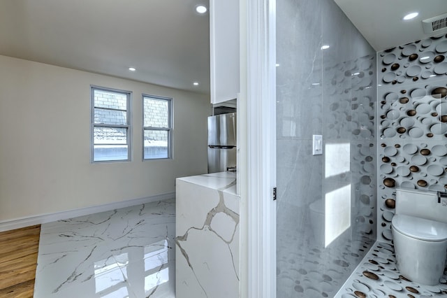 702 King St, Stratford, CT 06614 - bathroom with toilet, recessed lighting, a shower, and baseboards